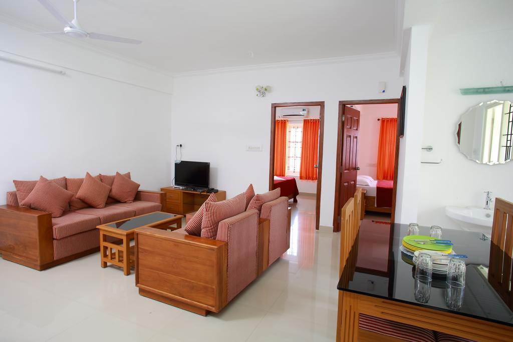 Phils' Residency & Banquets Hotel Kochi Стая снимка