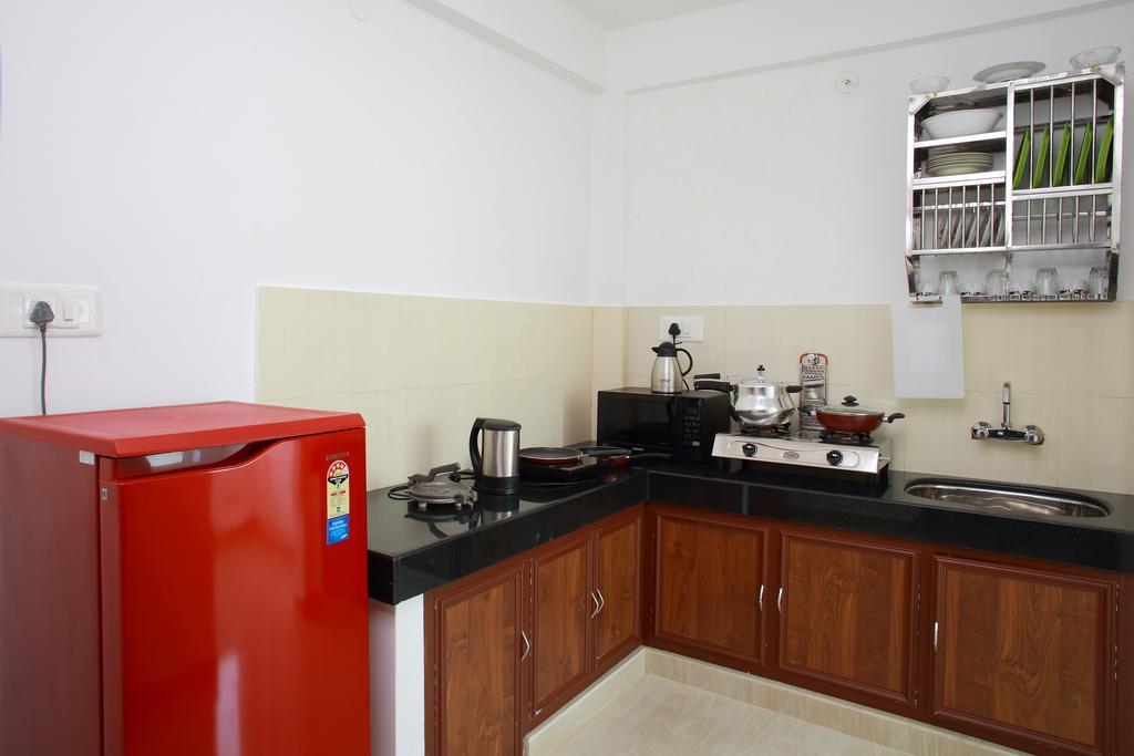 Phils' Residency & Banquets Hotel Kochi Стая снимка