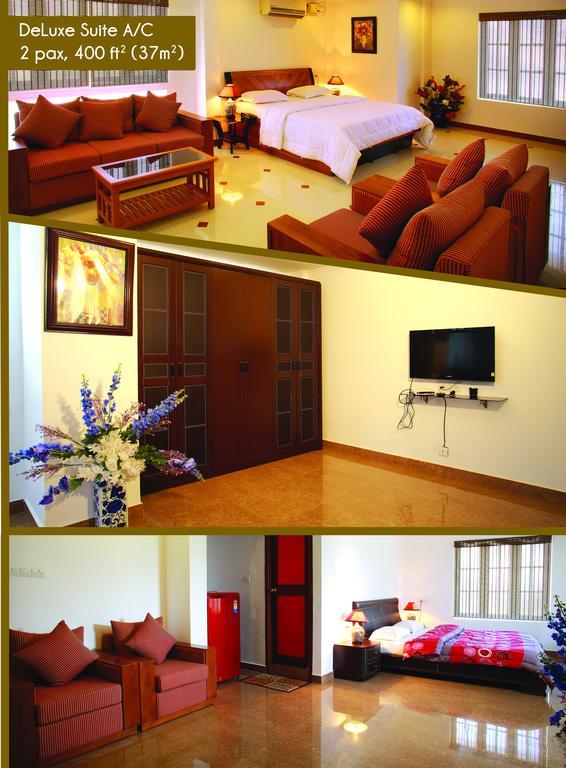 Phils' Residency & Banquets Hotel Kochi Стая снимка